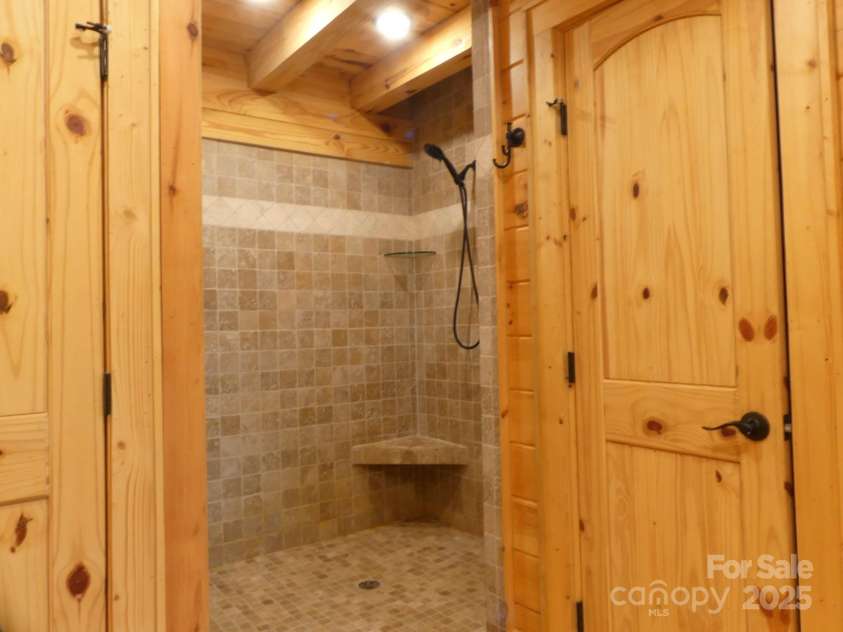 214 Whitney Boulevard, Lake Lure, NC 28746.  MLS# CAR4231828, YatesRealty ID 1404. Primary Bath