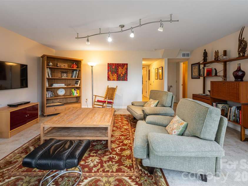 168 Skyview Circle, Asheville, NC 28804.  MLS# CAR4349077, YatesRealty ID 14041. Lower level den