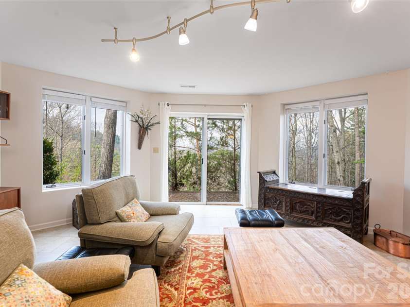 168 Skyview Circle, Asheville, NC 28804.  MLS# CAR4349077, YatesRealty ID 14041. Lower level den