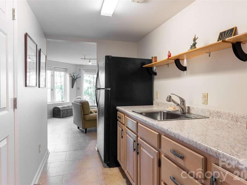 168 Skyview Circle, Asheville, NC 28804.  MLS# CAR4349077, YatesRealty ID 14041. Lower level kitchenette