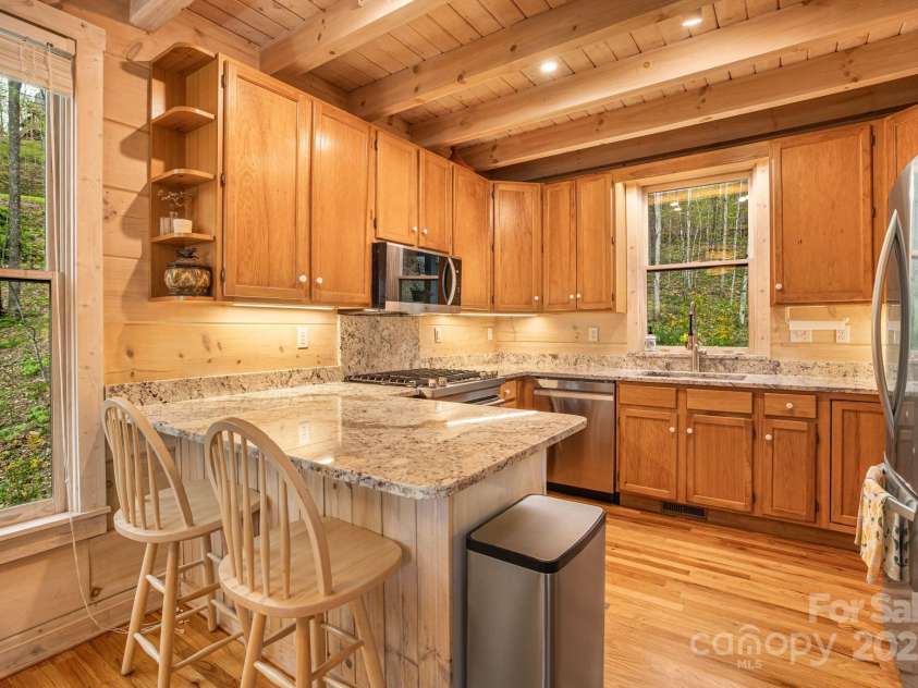 60 Laurel Lane, Mars Hill, NC 28754.  MLS# CAR4256396, YatesRealty ID 14054. Beautiful granite countertops and stainless steal appaliances.