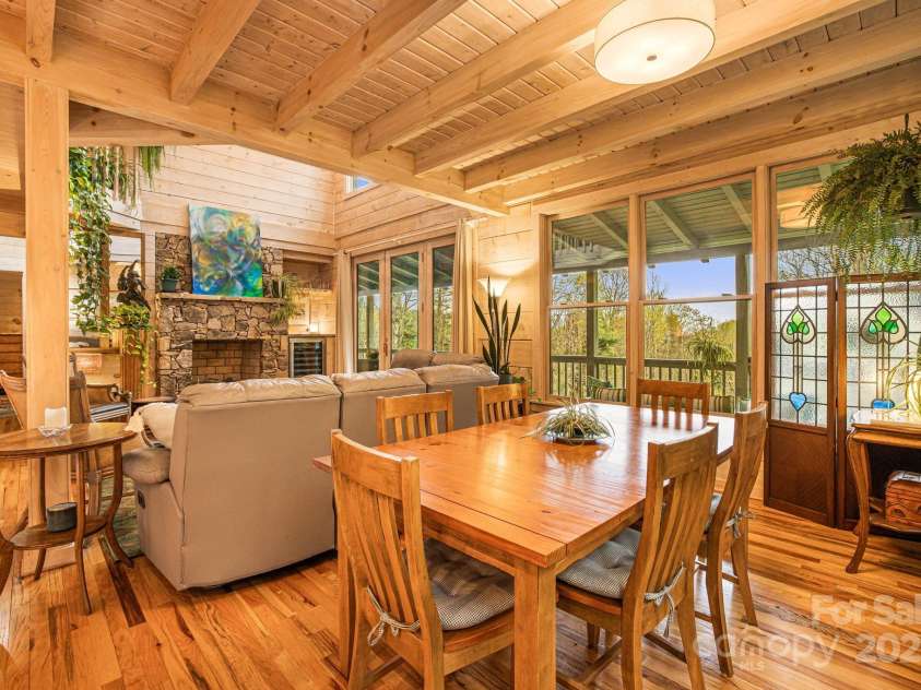 60 Laurel Lane, Mars Hill, NC 28754.  MLS# CAR4256396, YatesRealty ID 14054. Dining area overlooking the wildflower meadow.