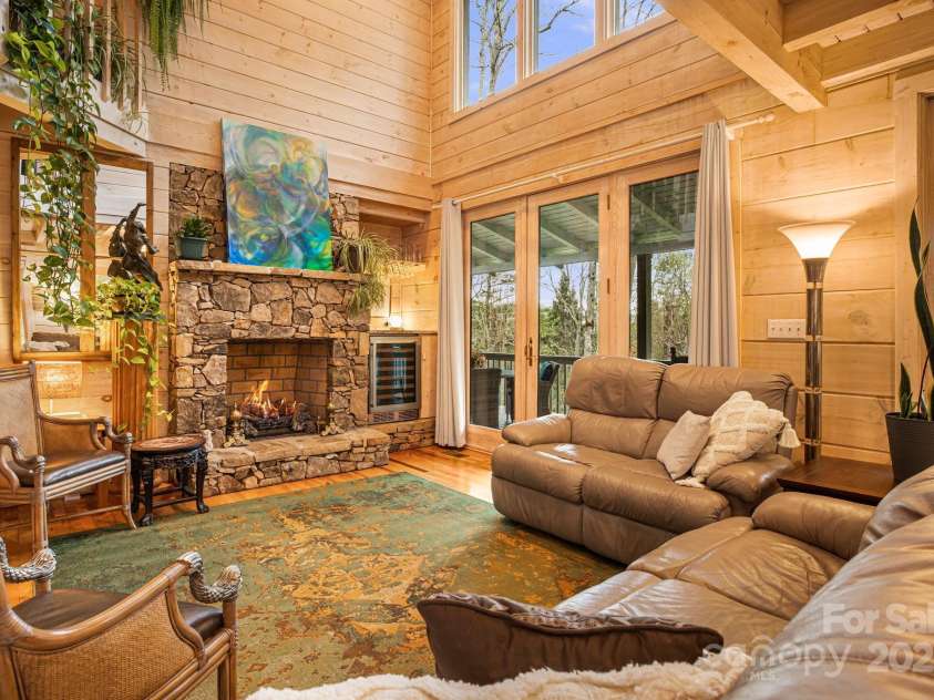 60 Laurel Lane, Mars Hill, NC 28754.  MLS# CAR4256396, YatesRealty ID 14054. Gas log fireplace for the cool evening.s.