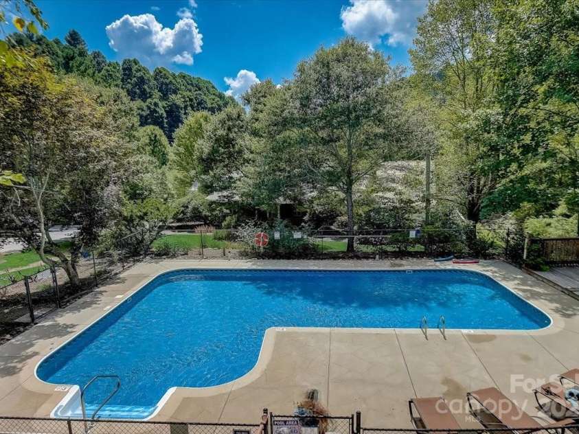 60 Laurel Lane, Mars Hill, NC 28754.  MLS# CAR4256396, YatesRealty ID 14054. Wolf Laurel Village Club Pool.