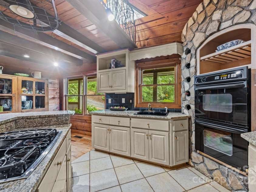 670 Barber Road, Zirconia, NC 28790.  MLS# CAR4293053, YatesRealty ID 1406. 