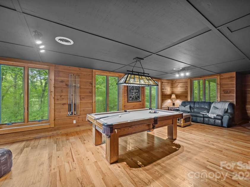 670 Barber Road, Zirconia, NC 28790.  MLS# CAR4293053, YatesRealty ID 1406. Billiard room