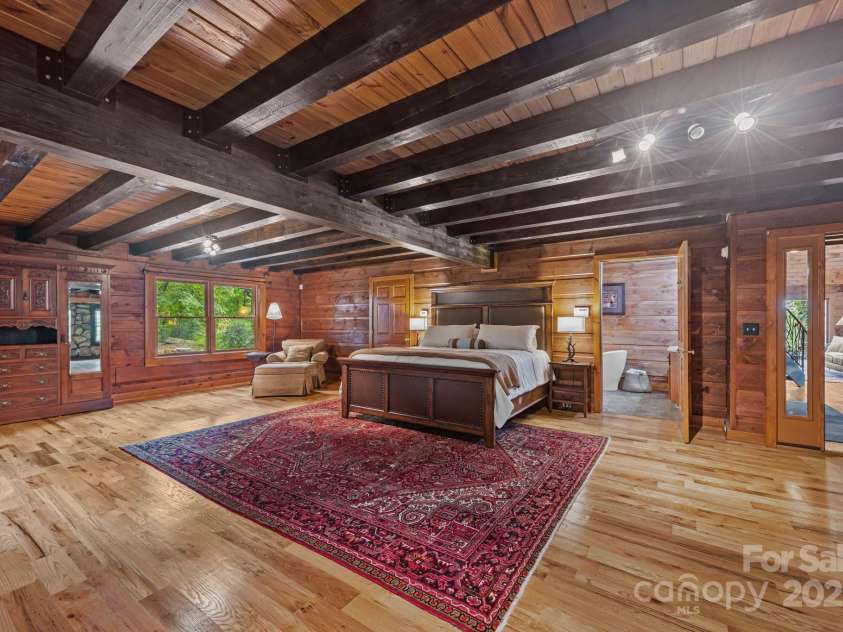 670 Barber Road, Zirconia, NC 28790.  MLS# CAR4293053, YatesRealty ID 1406. Primary bedroom