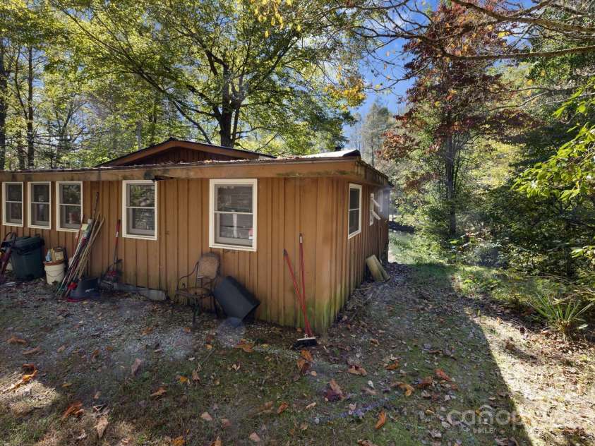 1051 Kim Miller Road, Lake Toxaway, NC 28747.  MLS# CAR4185123, YatesRealty ID 14061. Guest Cottage!