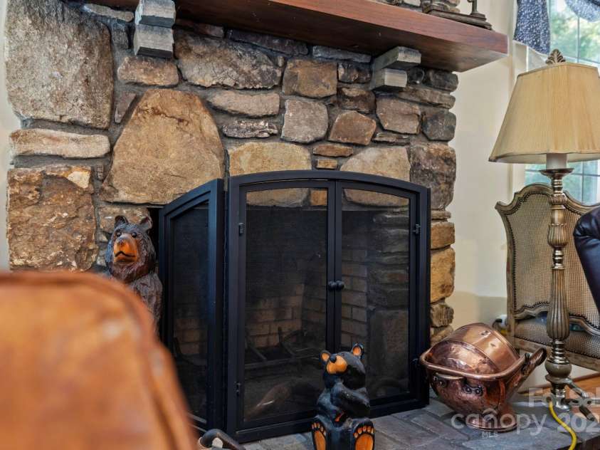 1051 Kim Miller Road, Lake Toxaway, NC 28747.  MLS# CAR4185123, YatesRealty ID 14061. Wood Burning Fireplace!
