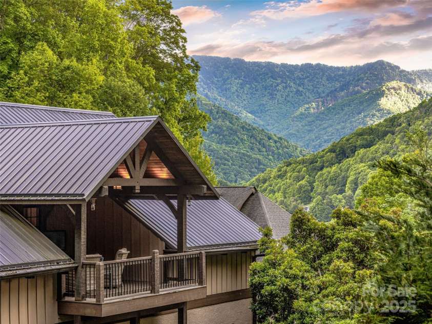 202 Emerald Lane, Maggie Valley, NC 28751.  MLS# CAR4047356, YatesRealty ID 14071. Elevated Guest House balcony.