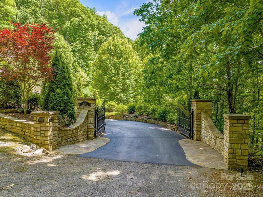 202 Emerald Lane, Maggie Valley, NC 28751.  MLS# CAR4047356, YatesRealty ID 14071. Private gated entrance.
