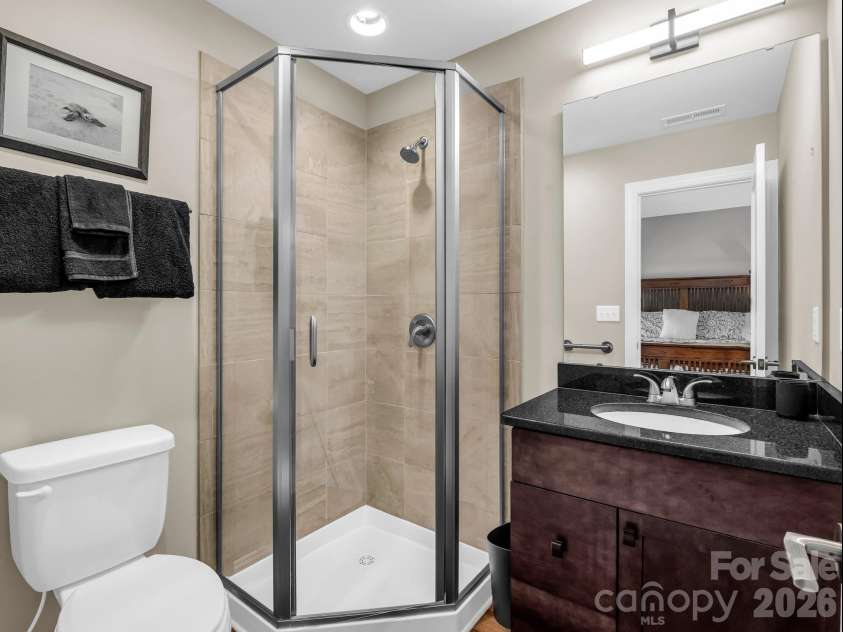 29 Stonehollow Lane, Brevard, NC 28712.  MLS# CAR4347760, YatesRealty ID 14076. 3rd bathroom upstairs