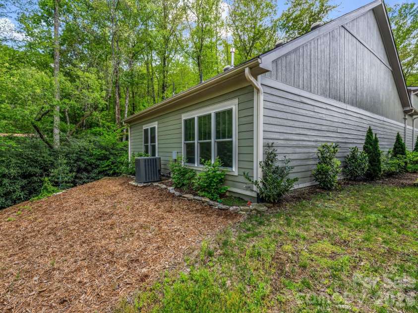 29 Stonehollow Lane, Brevard, NC 28712.  MLS# CAR4347760, YatesRealty ID 14076. Back yard