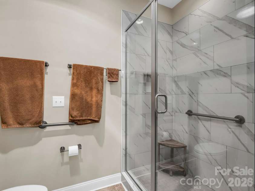 29 Stonehollow Lane, Brevard, NC 28712.  MLS# CAR4347760, YatesRealty ID 14076. Primary bath, tiled shower