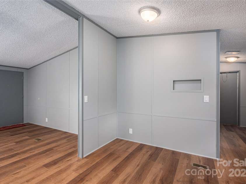 376 Puzzle Creek Road, Bostic, NC 28018.  MLS# CAR4260139, YatesRealty ID 14076. Doublewide living dining area