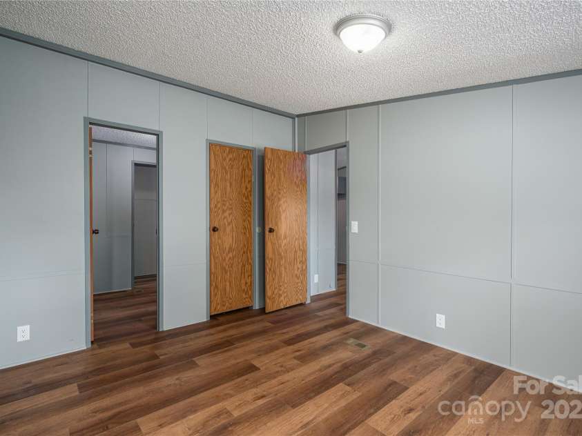 376 Puzzle Creek Road, Bostic, NC 28018.  MLS# CAR4260139, YatesRealty ID 14076. Doublewide primary bedroom