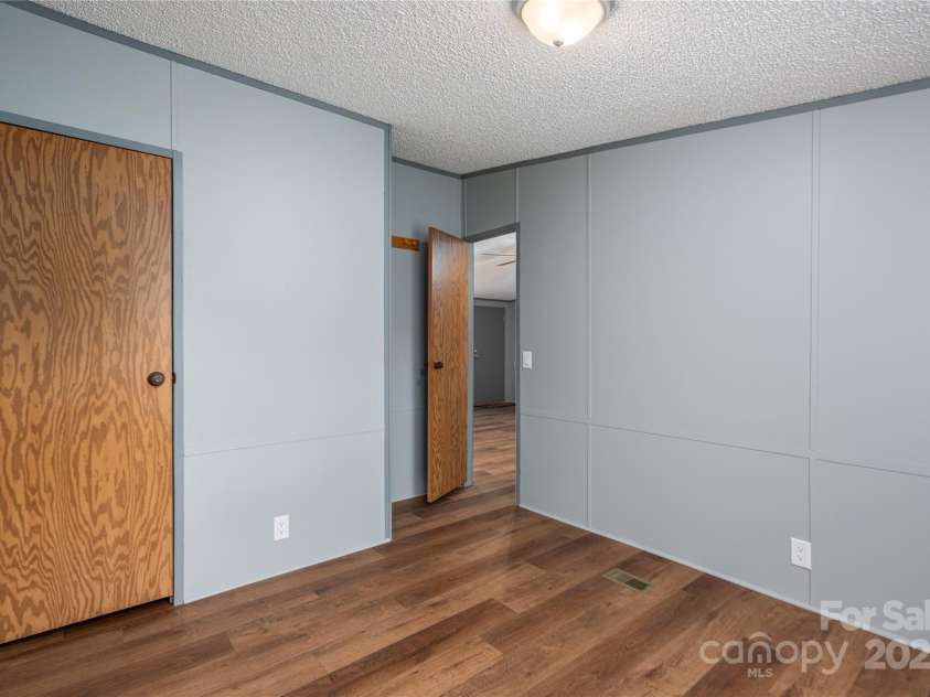 376 Puzzle Creek Road, Bostic, NC 28018.  MLS# CAR4260139, YatesRealty ID 14076. Doublewide second bedroom