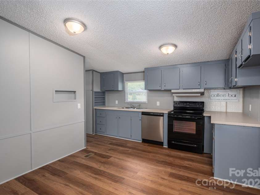 376 Puzzle Creek Road, Bostic, NC 28018.  MLS# CAR4260139, YatesRealty ID 14076. DW kitchen/diniing