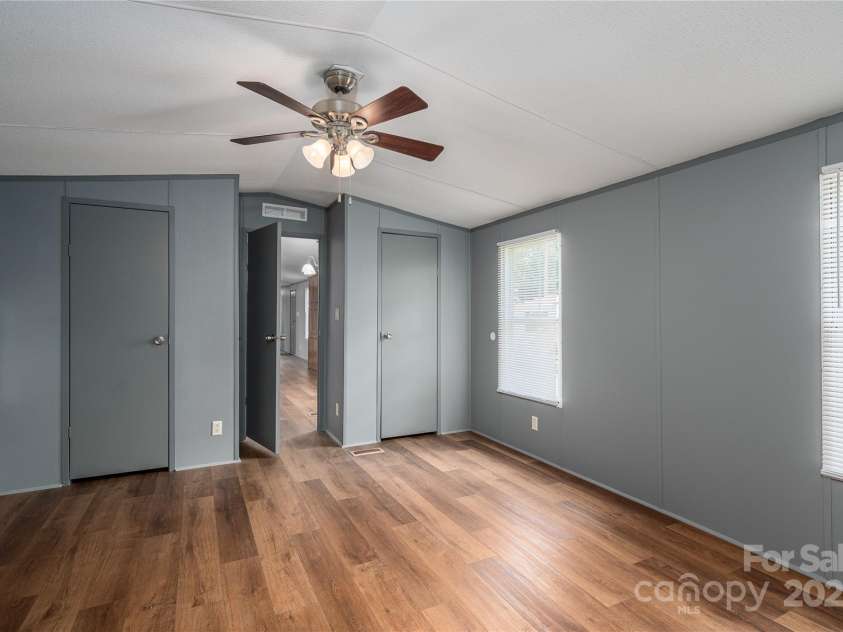 376 Puzzle Creek Road, Bostic, NC 28018.  MLS# CAR4260139, YatesRealty ID 14076. Single wide primary bedroom