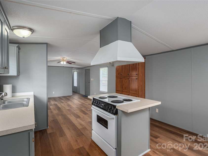 376 Puzzle Creek Road, Bostic, NC 28018.  MLS# CAR4260139, YatesRealty ID 14076. Single wide stove and hood vent