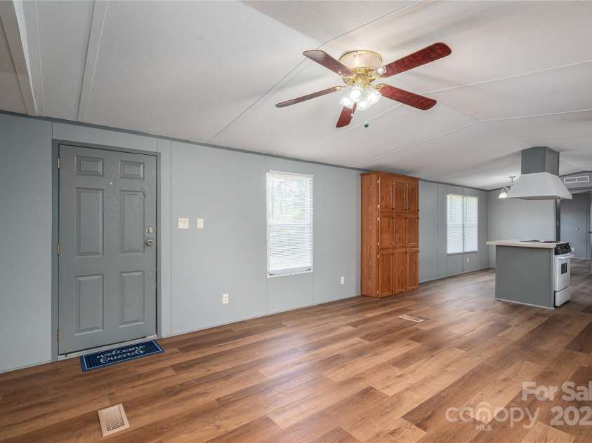 376 Puzzle Creek Road, Bostic, NC 28018.  MLS# CAR4260139, YatesRealty ID 14076. Singlewide front door/living area