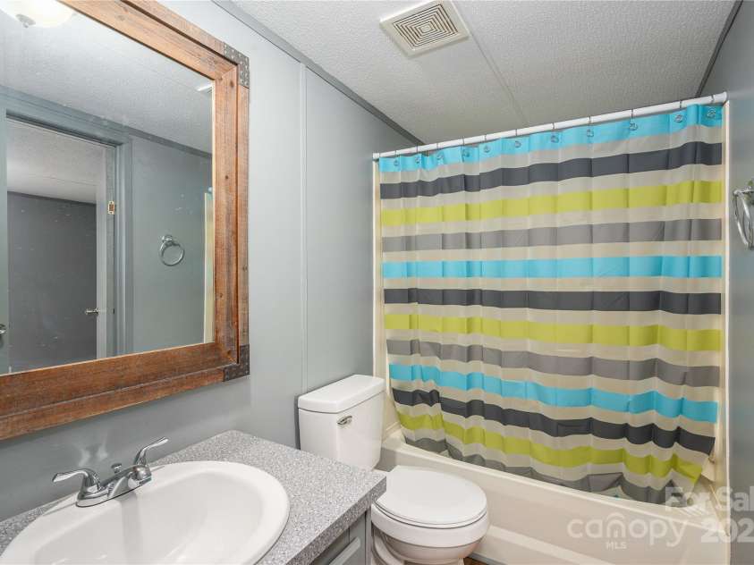 376 Puzzle Creek Road, Bostic, NC 28018.  MLS# CAR4260139, YatesRealty ID 14076. Singlewide second bath