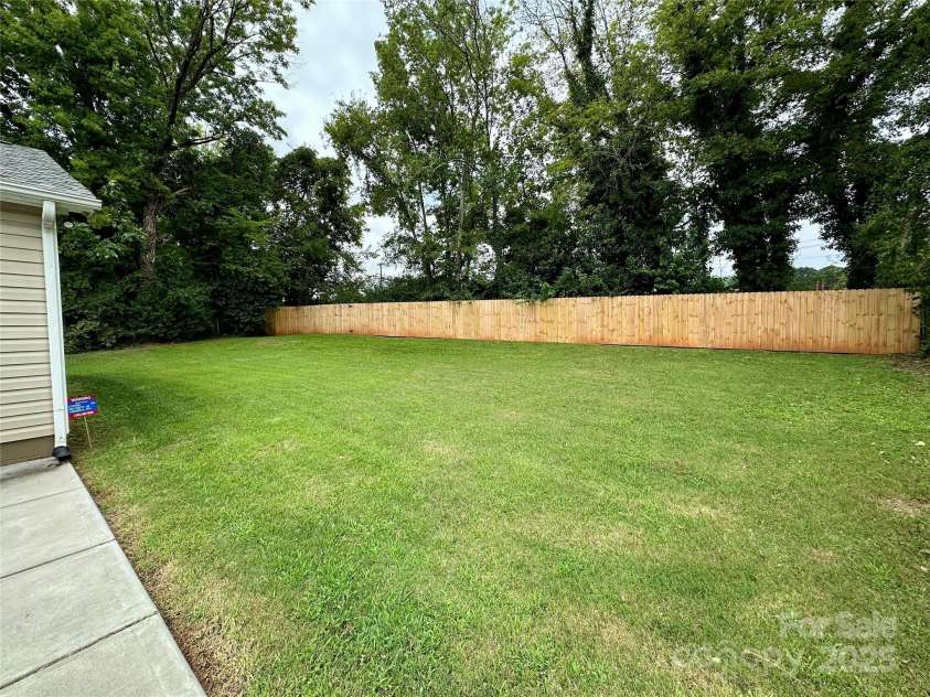 2510 Sherrill Street, Charlotte, NC 28208.  MLS# CAR4294165, YatesRealty ID 1408. Flat, fully fenced yard