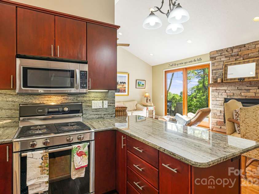 411 Alta Circle, Hendersonville, NC 28739.  MLS# CAR4250586, YatesRealty ID 14083. 