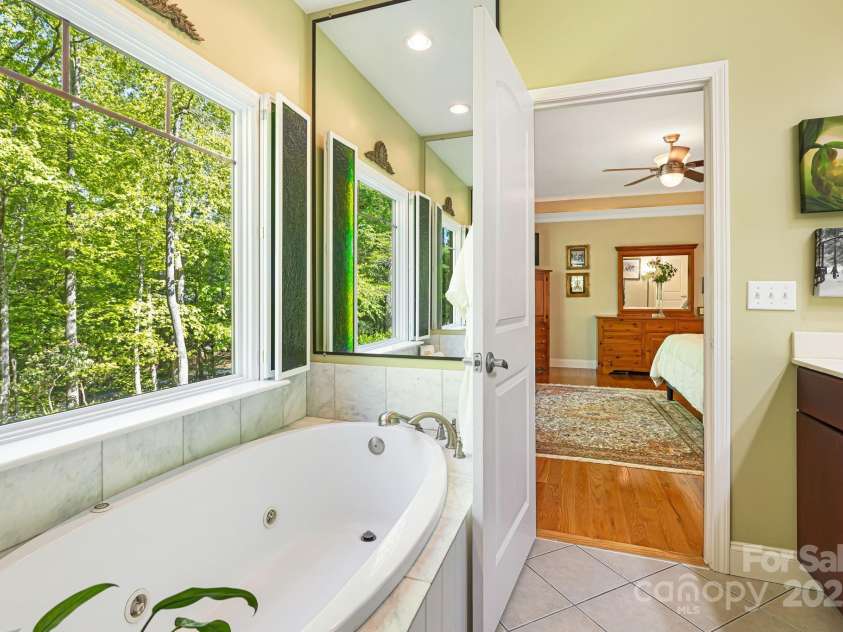 411 Alta Circle, Hendersonville, NC 28739.  MLS# CAR4250586, YatesRealty ID 14083. 