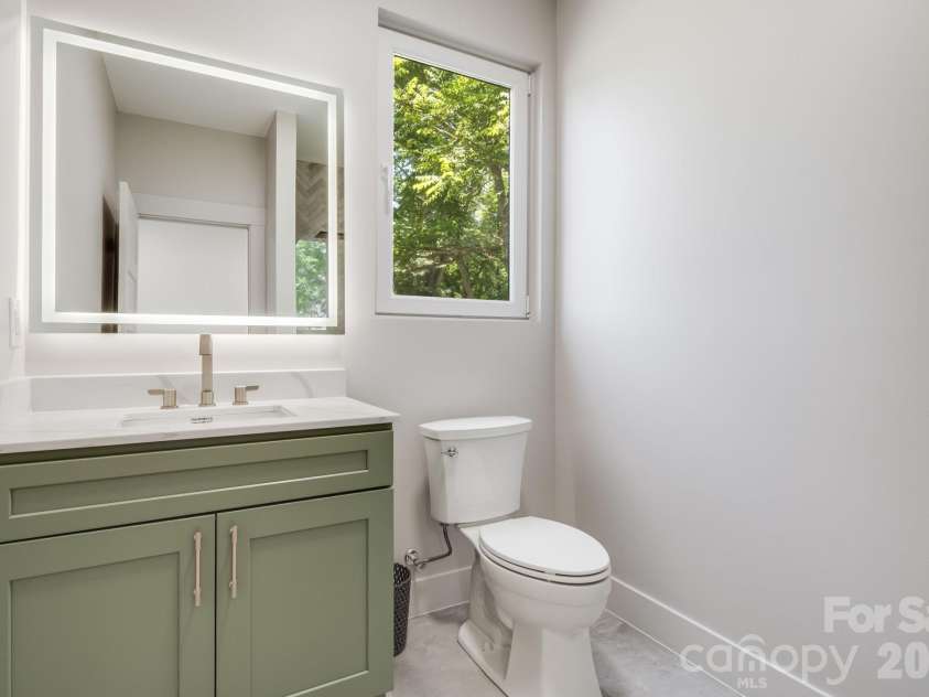 211 Ruby Avenue, Black Mountain, NC 28711.  MLS# CAR4400341, YatesRealty ID 14084. Main Level Bathroom