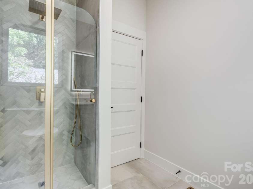 211 Ruby Avenue, Black Mountain, NC 28711.  MLS# CAR4400341, YatesRealty ID 14084. Main Level Bathroom