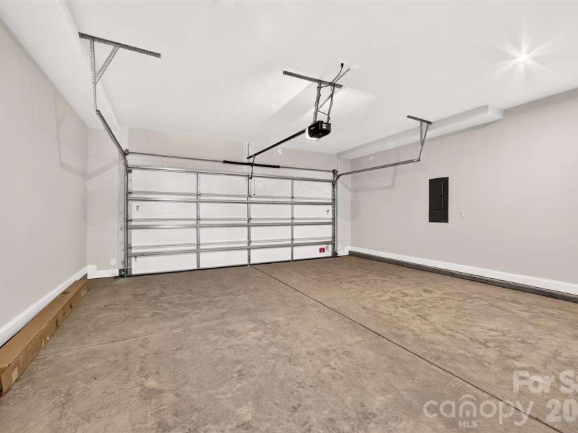 6012 Yellow Buckeye Drive, Charlotte, NC 28277.  MLS# CAR4396146, YatesRealty ID 14085. 2 bay garage