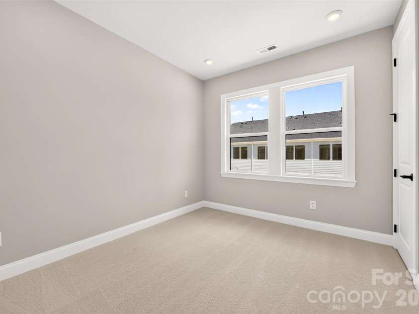 6012 Yellow Buckeye Drive, Charlotte, NC 28277.  MLS# CAR4396146, YatesRealty ID 14085. Secondary bedroom