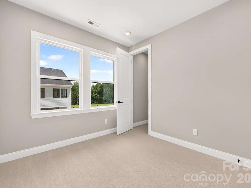 6012 Yellow Buckeye Drive, Charlotte, NC 28277.  MLS# CAR4396146, YatesRealty ID 14085. Secondary bedroom