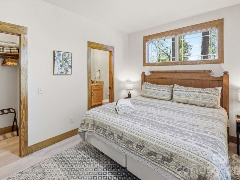 131 Pier Point Drive, Lake Lure, NC 28746.  MLS# CAR4371285, YatesRealty ID 14088. 