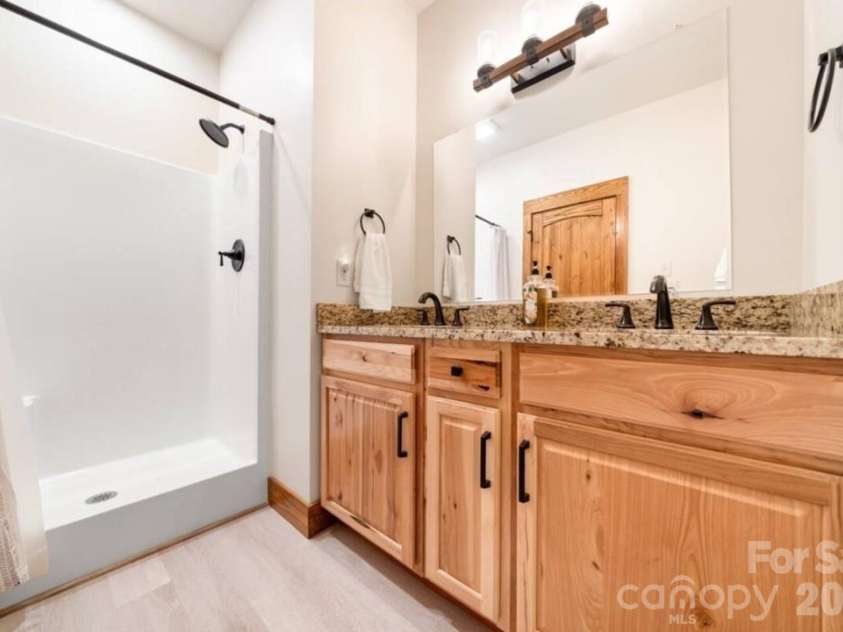131 Pier Point Drive, Lake Lure, NC 28746.  MLS# CAR4371285, YatesRealty ID 14088. 