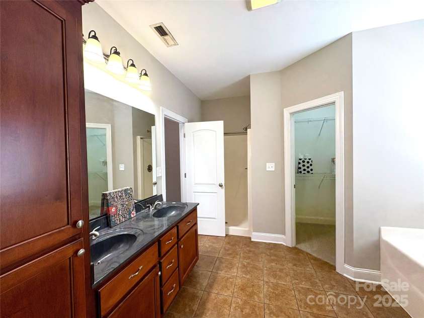 402 Church Street, Locust, NC 28097.  MLS# CAR4299636, YatesRealty ID 1409. 