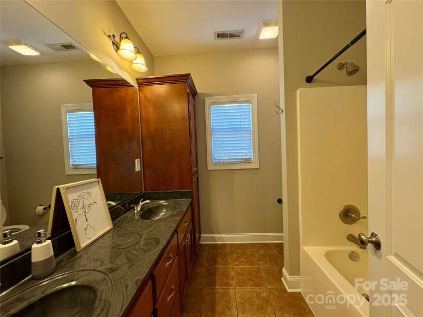 402 Church Street, Locust, NC 28097.  MLS# CAR4299636, YatesRealty ID 1409. 