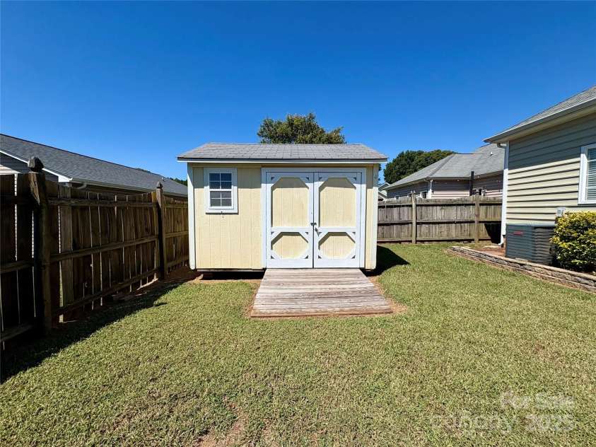 402 Church Street, Locust, NC 28097.  MLS# CAR4299636, YatesRealty ID 1409. 