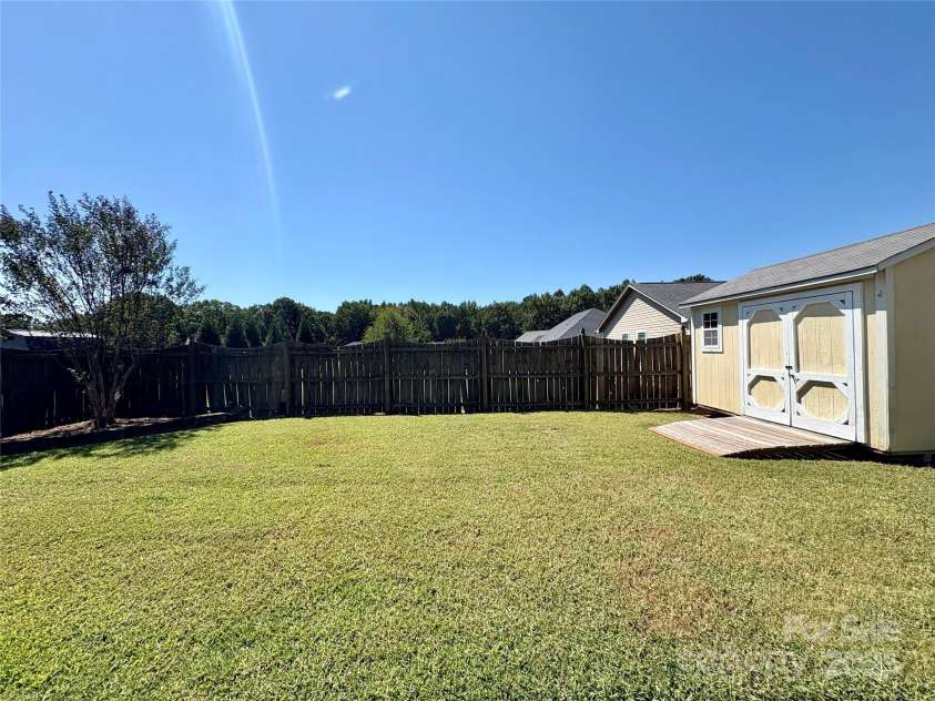 402 Church Street, Locust, NC 28097.  MLS# CAR4299636, YatesRealty ID 1409. 