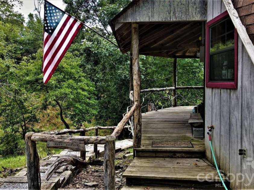 745 Broom Road, Tuckasegee, NC 28783.  MLS# CAR4343456, YatesRealty ID 1409. 