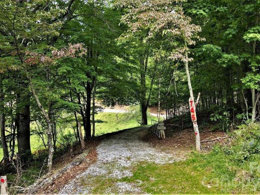 745 Broom Road, Tuckasegee, NC 28783.  MLS# CAR4343456, YatesRealty ID 1409. 