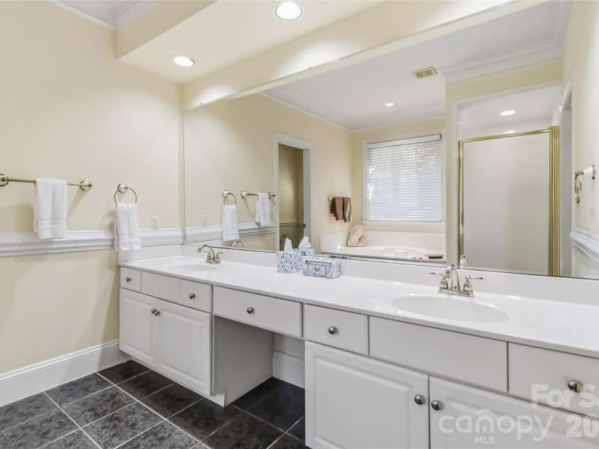 6208 Highview Road, Matthews, NC 28104.  MLS# CAR4363062, YatesRealty ID 14093. Primary bath with dual sinks