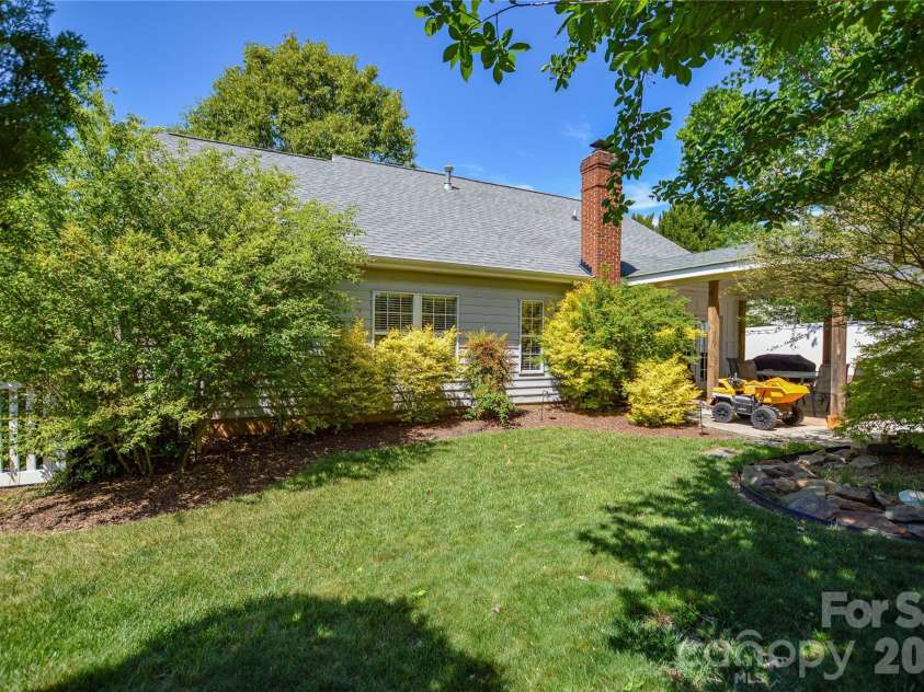 3602 Arthur Street, Indian Trail, NC 28079.  MLS# CAR4370198, YatesRealty ID 14095. Backyard with mature landscaping