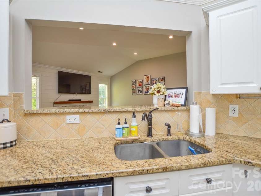 3602 Arthur Street, Indian Trail, NC 28079.  MLS# CAR4370198, YatesRealty ID 14095. Kitchen looking into Great Room