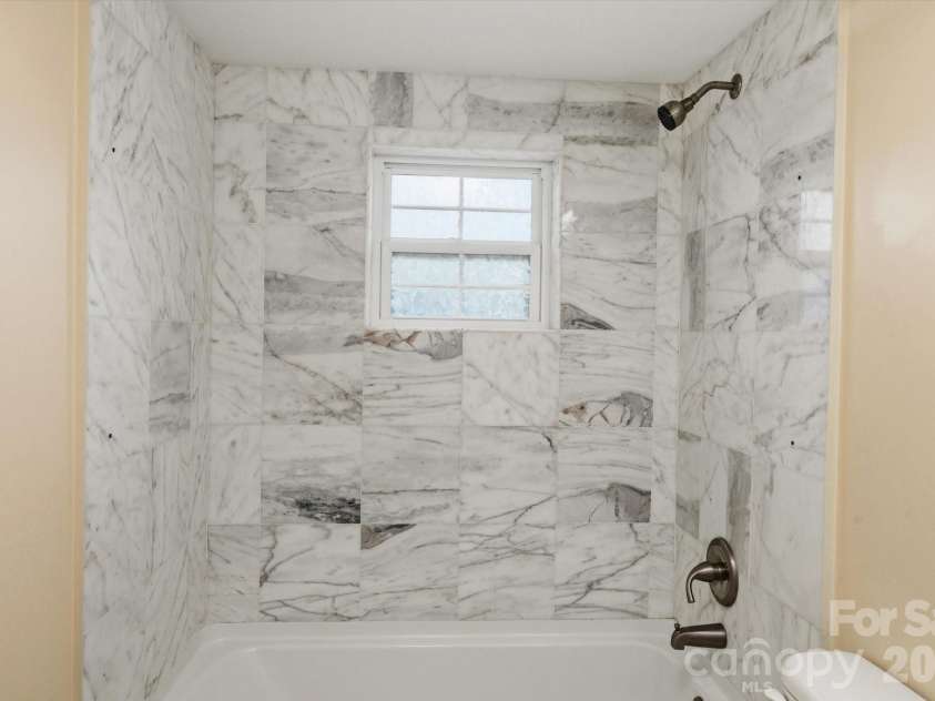 89 Carolina Avenue, Brevard, NC 28712.  MLS# CAR4366083, YatesRealty ID 14098. 