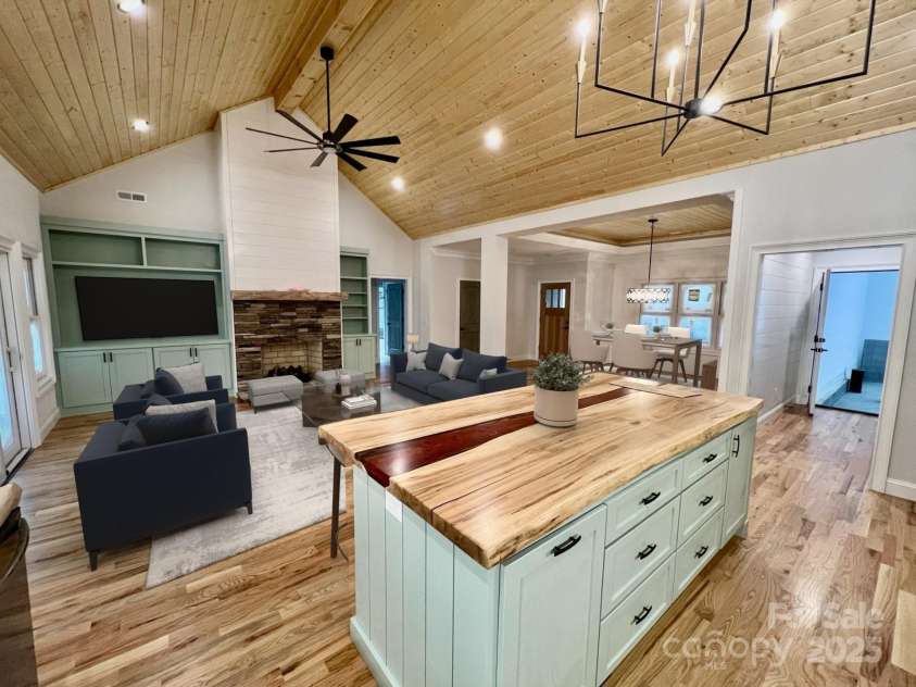 397 Soquili Drive, Brevard, NC 28712.  MLS# CAR4206304, YatesRealty ID 1410. Kitchen to Great Room