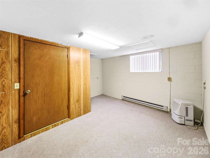 115 Bent Tree Drive, Hendersonville, NC 28739.  MLS# CAR4360026, YatesRealty ID 14102. Storage Unit!
