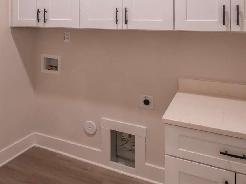 2630 Rose Street, Charlotte, NC 28208.  MLS# CAR4178972, YatesRealty ID 14110. Laundry 1 down