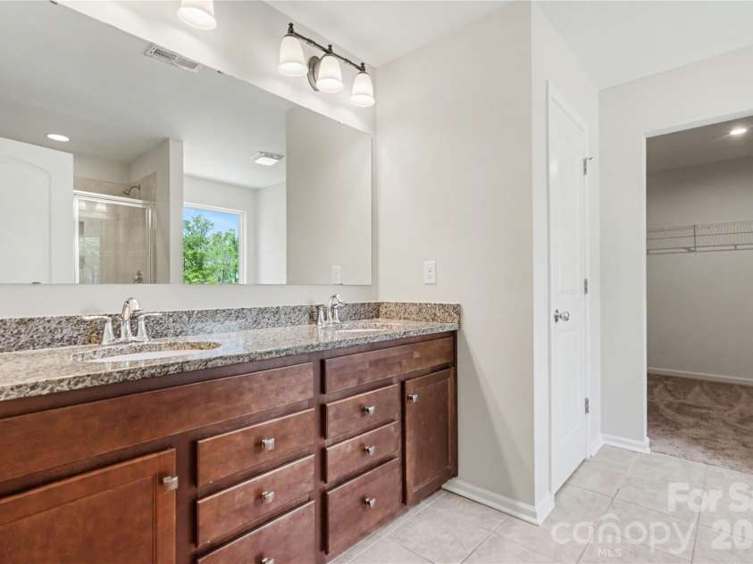 5048 Thomasville Drive, Belmont, NC 28012.  MLS# CAR4370628, YatesRealty ID 14111. Ensuite with Dual Sinks